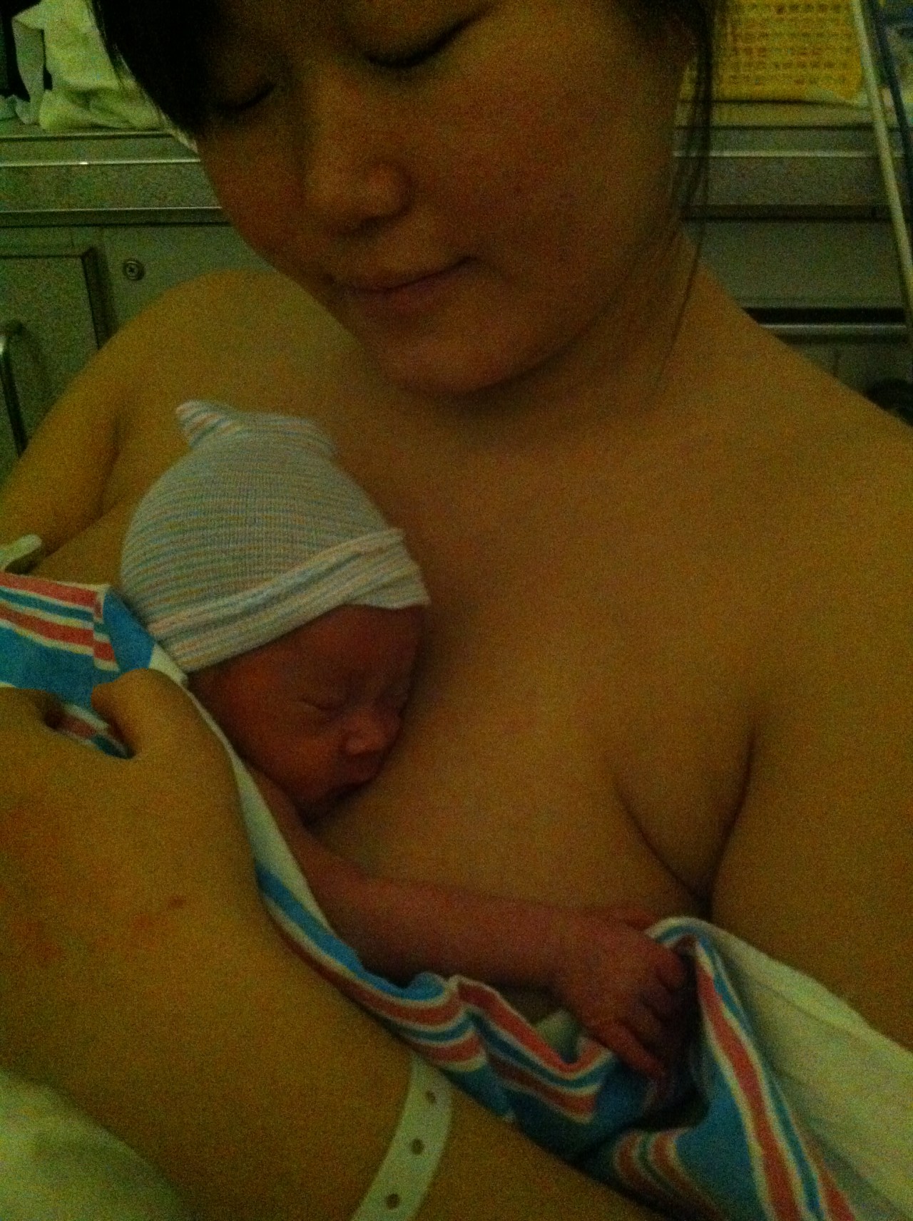 Trying skin to skin holding (Kangaroo) to help his heart along